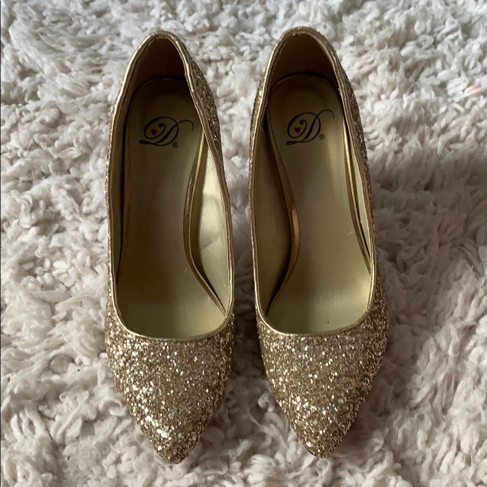Gold stilettos